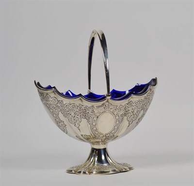 Lot 122 - A Victorian silver sugar bowl, by Martin and Hall, London, 1879, in the Georgian style, fluted oval