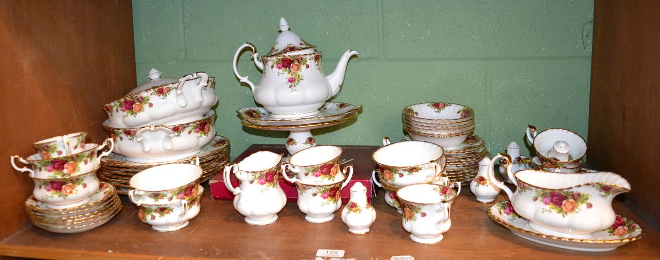 Lot 125 - A Royal Albert Country Roses pattern tea and part dinner service
