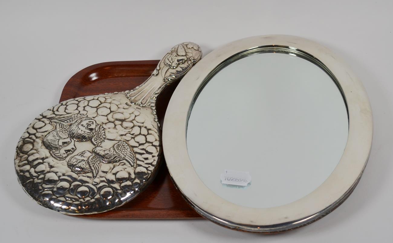 Lot 149 - A George V silver-mounted dressing-table mirror; maker's mark rubbed, Birmingham, 1922, oval...
