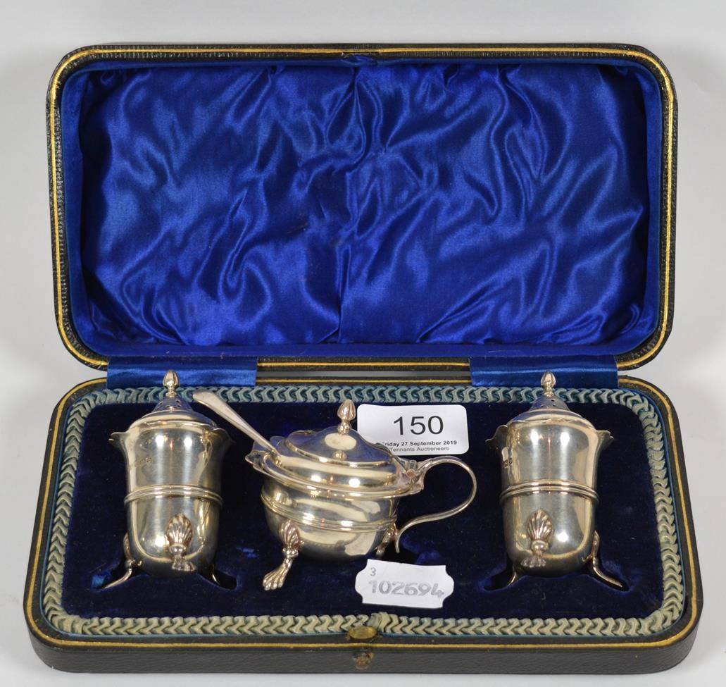 Lot 150 - A George V cased three-piece silver condiment-set, by Robert Fead Mosley, Sheffield, 1913,...