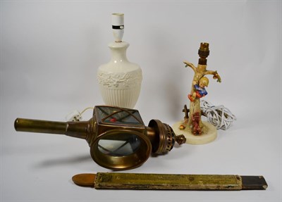 Lot 154 - Hummel figural table lamp, Wedgwood Etruria creamware table lamp, brass carriage lamp and a...