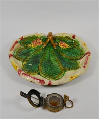 Lot 155 - A late 19/early 20th century continental majolica pottery leaf dish together with a military...