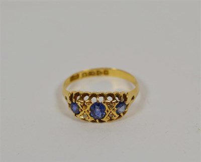 Lot 168 - An 18 carat gold sapphire and diamond ring, finger size P1/2  NB one diamond deficient