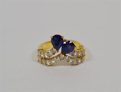 Lot 169 - A sapphire and diamond dress ring, unmarked, finger size O