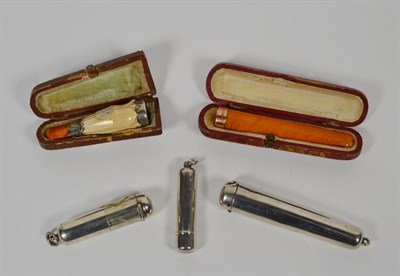 Lot 178 - Silver cheroot case and associated cheroot holder stamped sterling, another with striped bands in a