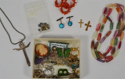 Lot 183 - A quantity of costume jewellery including a cameo brooch/pendant, necklaces, pendants including two