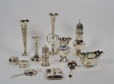 Lot 187 - A group of assorted silver including: a George VI silver caster and cream-jug, by Viners,...