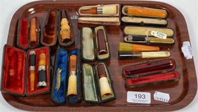 Lot 193 - Ten cased cheroot holders, some in amber with silver mounts and two others