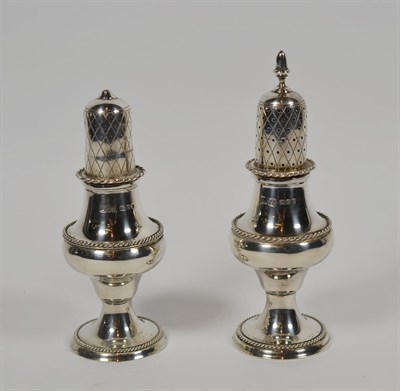 Lot 197 - A Georgian style silver baluster salt and pepperette, LRW, London 1981 (2)