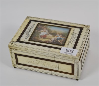 Lot 202 - Early 20th century small musical box, ivory veneered and with inset miniature to the lid...