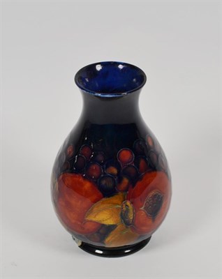 Lot 203 - A William Moorcroft pomegranate pattern vase