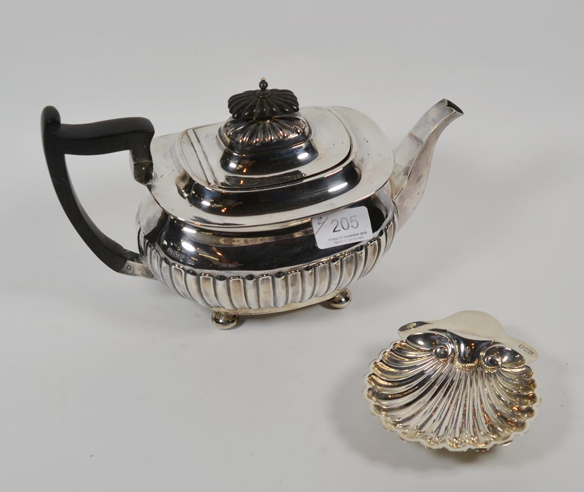 Lot 205 - A Victorian silver teapot and a Victorian silver butter-dish, the teapot by Walker and Hall,...