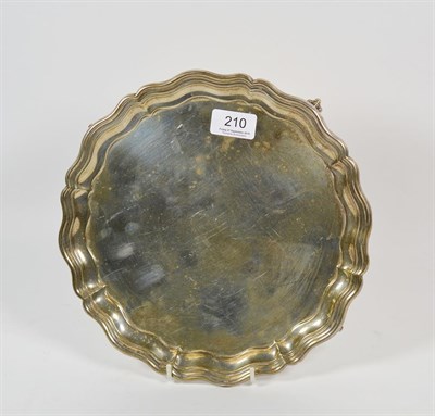 Lot 210 - A Georgian style silver piecrust salver, by James Dixon & Sons, Sheffield, 1944, 28cm diameter