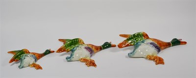 Lot 217 - A set of three mid-20th century ceramic wall hanging flying geese, marked Made in England,...