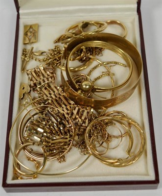 Lot 246 - Miscellaneous 9 carat gold and yellow metal items including bangles, gate link bracelets,...