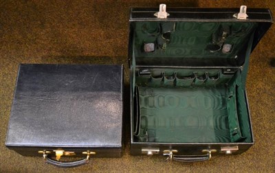 Lot 289 - A leather suitcase, and a travelling case (2)