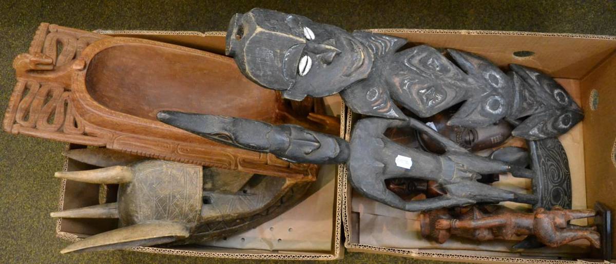 Lot 305 - A collection of tribal art to include carved masks and figures (two boxes)