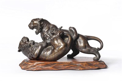 Lot 176 - A Japanese Bronze Group of Two Fighting Tigers, Meiji period (1868-1912), one dominating the...