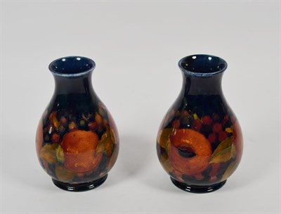 Lot 321 - Pair of William Moorcroft pomegranate pattern vases