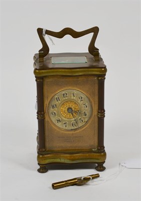 Lot 324 - A late 19th/early 20th century French brass carriage clock, retailed by Goldsmiths &...