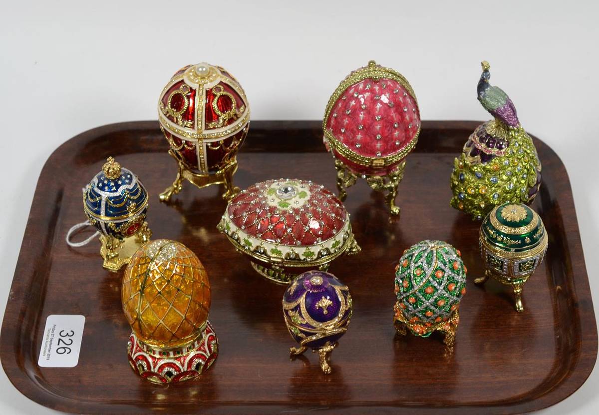 Lot 326 - Nine miniature Faberge style Imperial Russian Easter eggs, early 21st century, including a...