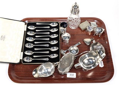 Lot 332 - A group of silver including: a cased set twelve George V silver teaspoons, by Thomas Bradbury...