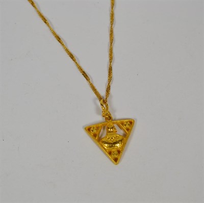 Lot 356 - A triangular pendant on chain, stamped '916', chain length 48.5cm