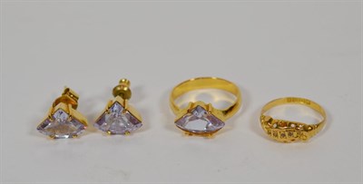 Lot 358 - A pair of purple stone set stud earrings and matching ring, finger size O; and a further 18...