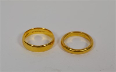 Lot 361 - Two 22 carat gold band rings, finger sizes M1/2 and P