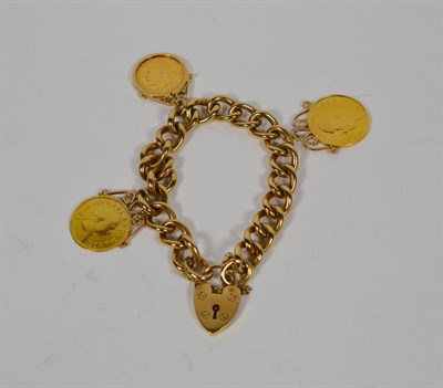 Lot 363 - A curb bracelet, each link stamped '9' '.375', hung with a 1914 half sovereign, a 1918 full...