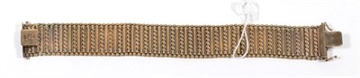 Lot 367 - A fancy link bracelet, stamped '375', length 20cm