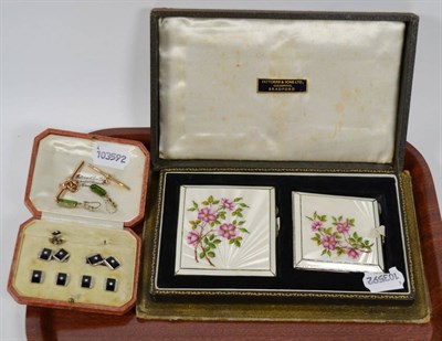 Lot 381 - Two floral decorated silver compacts, cased; a set of dress studs (one lacking); two 9 carat...