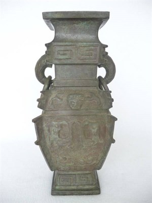 Lot 183 - A Chinese Archaistic Bronze Vase, Qing Dynasty, of square section baluster form with eagle's...