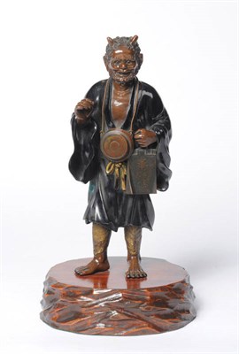 Lot 185 - A Japanese Parcel Gilt Bronze Figure of an Oni, Meiji period (1868-1912), with two horns,...