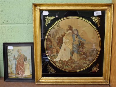 Lot 438 - 18th century silk and embroidered picture of a robed gent, with sword and holding a book,...