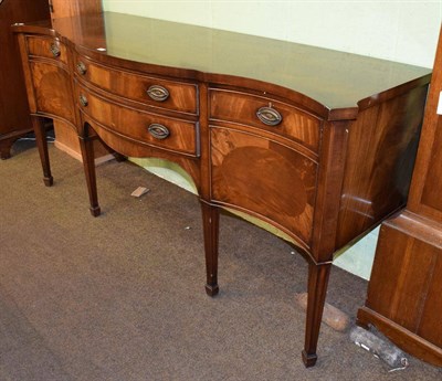 Lot 483 - Christopher Pratt, a reproduction mahogany serpentine shaped sideboard, 197cm wide