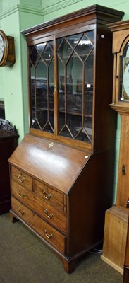 Lot 485 - George III mahogany bureau bookcase