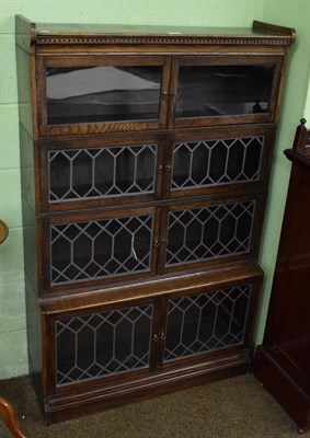 Lot 488 - Oak four tier sectional bookcase