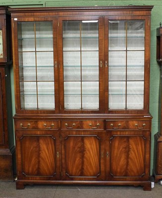 Lot 492 - Christopher Pratt, a reproduction mahogany and glazed bookcase, 150cm wide