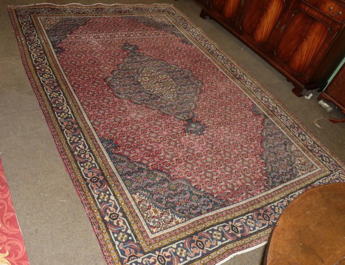 Lot 493 - Tabriz carpet, the Herati field with central medallion enclosed by samovar motif borders