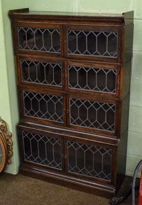 Lot 495 - Oak four tier sectional bookcase