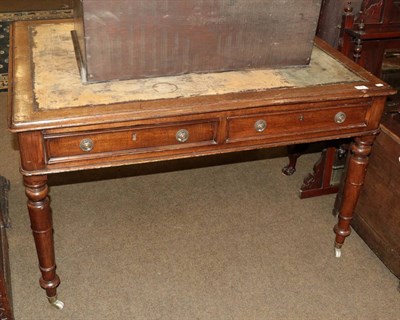 Lot 508 - A Victorian oak writing table, late 19th century, the moulded top above two real and two sham...