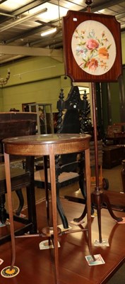 Lot 515 - An Edwardian mahogany and line inlaid circular display table; and a mahogany pole screen (2)