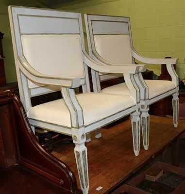 Lot 518 - Two reproduction grey and gilt painted French style armchairs