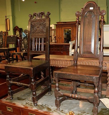 Lot 528 - An 18th century chair with carved panel back and another similar