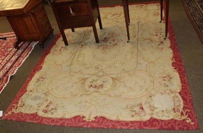 Lot 532 - Aubusson design flatweave carpet, China, modern, the ivory field centred by a naturalistic...