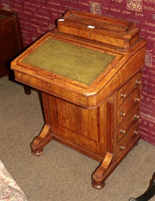 Lot 536 - A 19th century walnut inlaid Davenport with green leather mount