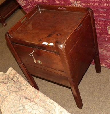 Lot 537 - A George III mahogany tray top bedside cupboard, late 18th century, the gallery top with three...