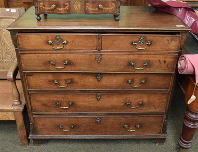 Lot 542 - A George III mahogany and pine lined secretaire chest, late 18th century, the top drawer with...