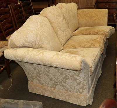 Lot 548 - A good quality three-seater sofa in cream floral fabric